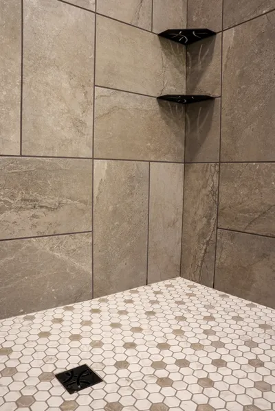 Custom shower tile work with natural stone in Bloomington, IN