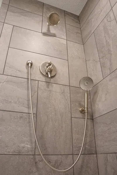 Shower fixtures and handheld showerhead installation in Bloomington, IN